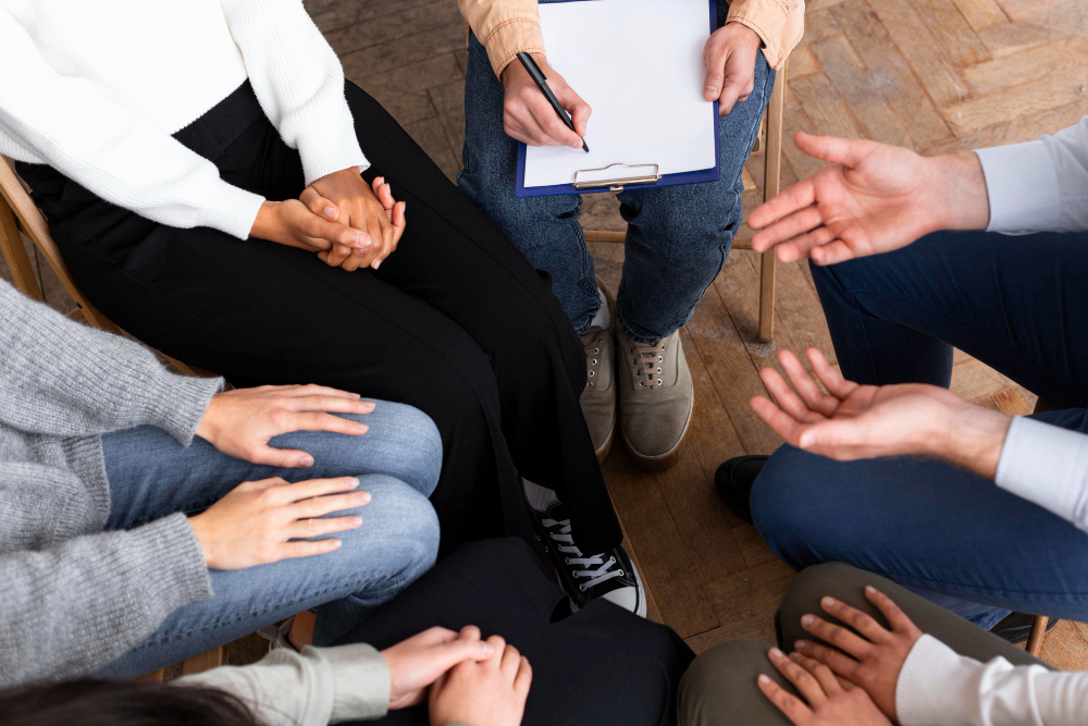 A calm and supportive treatment center environment showing a daily routine that includes morning meditation, group therapy sessions, individual counseling, wellness activities, and evening reflection, highlighting a structured path to recovery and healing.